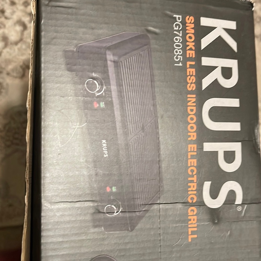 Brand new KRUPS smoke less indoor grill. Priced to sell.